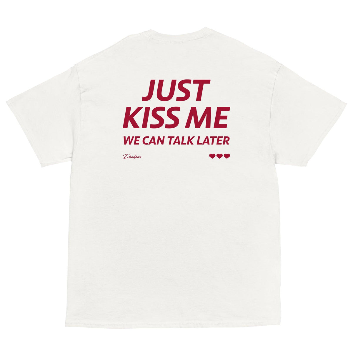 T-shirt unisex bianca UNTLD con scritta "Just kiss me, we can talk later" sul retro, stile casual e comodo.